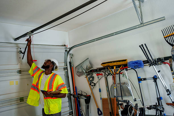 Professional Garage Door Panel Replacement technician working in Hauser, ID